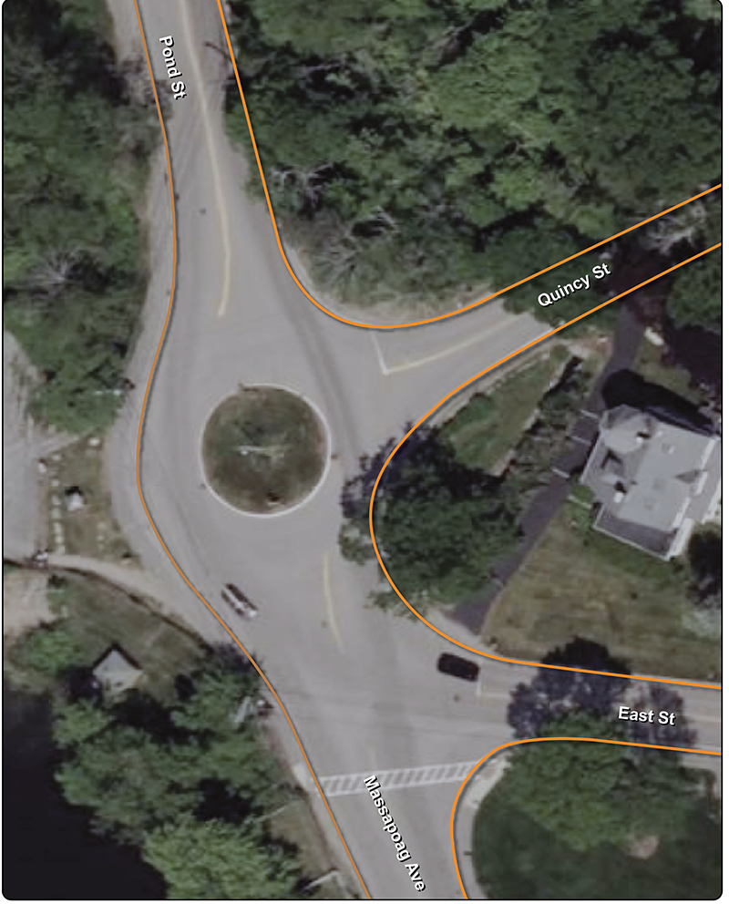 A map labeled "study area" showing an intersection with a traffic circle and four approaches. The approach from the north is named Pond Street. The approach from the northwest is named Quincy Street. The approach from the southeast is named East Street. The approach from the south is named Massapoag Avenue. There is a lake to the west of the intersection named Lake Massapoag.